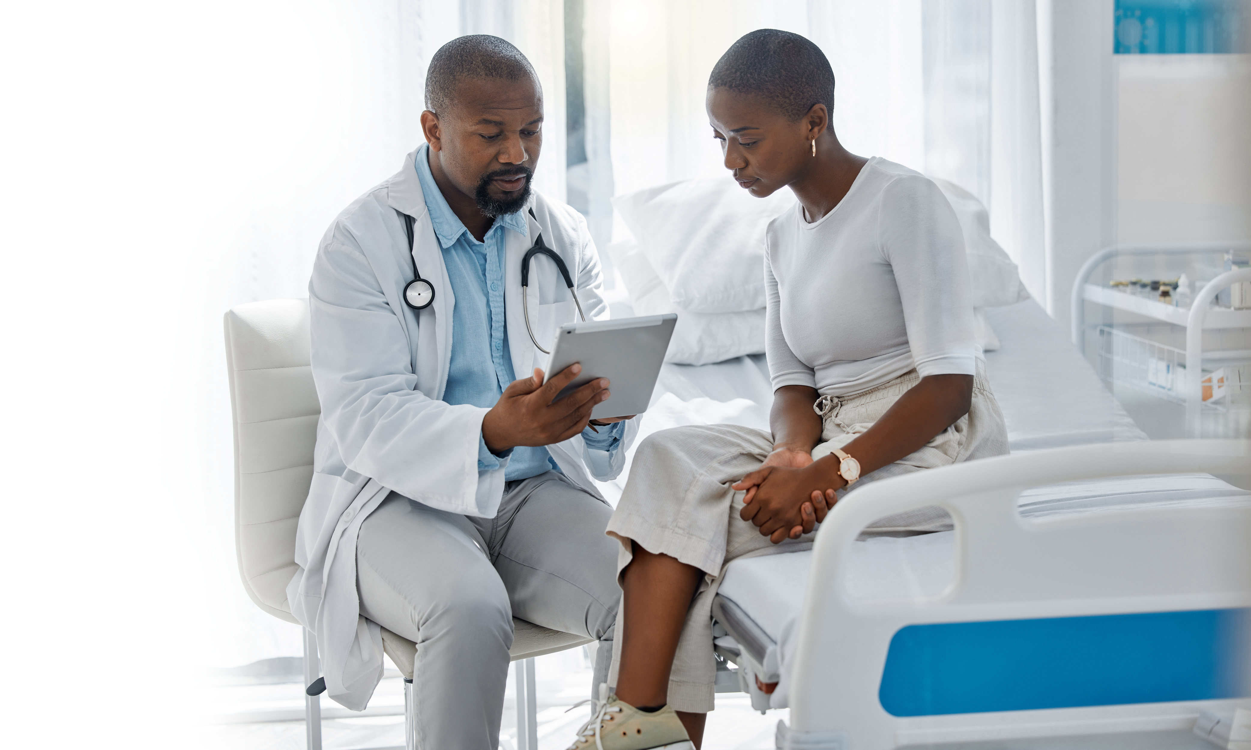 Doctor consulting with patient